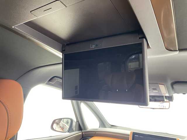 トヨタ ヴェルファイア ハイブリット Z プレミア 埼玉県 2025(令7)年 0.8万km ブラック 左右独立ムーンルーフ　/ユニバーサルステップ　/フリップダウンモニター　/純正ディスプレイオーディオ/　(FM/AM/TV/BT/USB)　/ＥＴＣ２．０　/パワーバックドア　/デジタルインナーミラー　/ブラインドスポットモニター　/コーナーセンサー　/レーダークルーズコントロール/ロードサインアシスト/安心降車アシスト/両側パワースライドドア/全席パワーシート/エアシート/シートヒーター/メモリーシート/ワイヤレス充電/パドルシフト/コンビハンドル/純正フロアマット