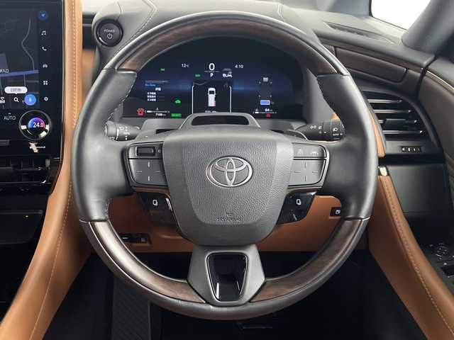 トヨタ ヴェルファイア ハイブリット Z プレミア 埼玉県 2025(令7)年 0.8万km ブラック 左右独立ムーンルーフ　/ユニバーサルステップ　/フリップダウンモニター　/純正ディスプレイオーディオ/　(FM/AM/TV/BT/USB)　/ＥＴＣ２．０　/パワーバックドア　/デジタルインナーミラー　/ブラインドスポットモニター　/コーナーセンサー　/レーダークルーズコントロール/ロードサインアシスト/安心降車アシスト/両側パワースライドドア/全席パワーシート/エアシート/シートヒーター/メモリーシート/ワイヤレス充電/パドルシフト/コンビハンドル/純正フロアマット