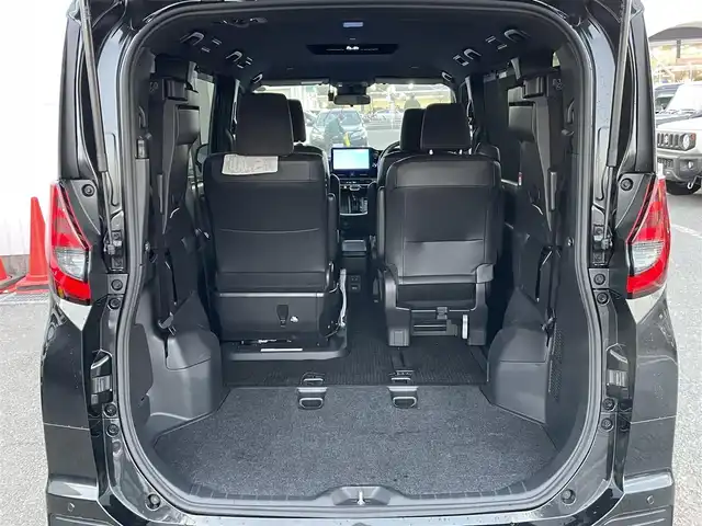 トヨタ ノア ハイブリッド S－G 東京都 2023(令5)年 1.5万km グリッターブラックガラスフレーク サイドリフトアップチルトシート装着車　/純正ナビ　/Ｂｌｕｅｔｏｏｔｈ　/フルセグＴＶ　/バックカメラ　/両側電動スライドドア　/ワンオーナー車　/シートヒーター　/純正ドライブレコーダー　/ＥＴＣ２．０/ABS/横滑り防止装置/コーナーセンサー/レーンアシスト/盗難防止装置/オートライト/オートマチックハイビーム/純正LED/衝突被害軽減システム/BSM