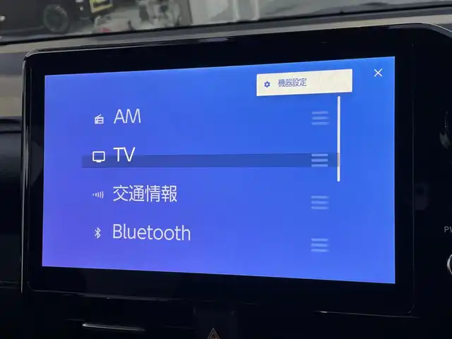 トヨタ ノア ハイブリッド S－G 東京都 2023(令5)年 1.5万km グリッターブラックガラスフレーク サイドリフトアップチルトシート装着車　/純正ナビ　/Ｂｌｕｅｔｏｏｔｈ　/フルセグＴＶ　/バックカメラ　/両側電動スライドドア　/ワンオーナー車　/シートヒーター　/純正ドライブレコーダー　/ＥＴＣ２．０/ABS/横滑り防止装置/コーナーセンサー/レーンアシスト/盗難防止装置/オートライト/オートマチックハイビーム/純正LED/衝突被害軽減システム/BSM