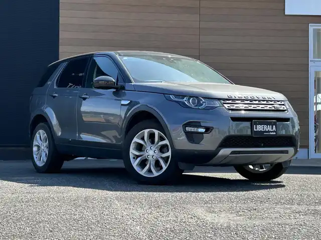 ランドローバー ランドローバー ディスカバリースポーツ　HSE 宮崎県 2019(令1)年 2.9万km ガンＭ ワンオーナー/純正ナビゲーション/・Bluetooth/・CD DVD/・USB/・フルセグTV/３列７人乗り/ETC２．０/MEDIRIANスピーカー/ハンドルヒーター/ブラインドスポットモニター/アンビエントライト/純正１９インチアルミホイール/黒レザーシート/・D/N席　パワーシート/・D/N席　シートヒーター/前後コーナーセンサー/キーレスエントリー/・スマートキー/クルーズコントロール/ボディカラー　コリスグレー/プッシュスタート