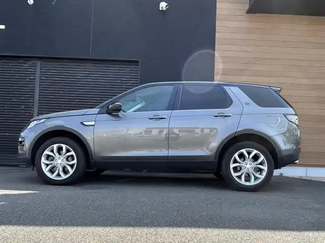 ランドローバー ランドローバー ディスカバリースポーツ　HSE 宮崎県 2019(令1)年 2.9万km ガンＭ ワンオーナー/純正ナビゲーション/・Bluetooth/・CD DVD/・USB/・フルセグTV/３列７人乗り/ETC２．０/MEDIRIANスピーカー/ハンドルヒーター/ブラインドスポットモニター/アンビエントライト/純正１９インチアルミホイール/黒レザーシート/・D/N席　パワーシート/・D/N席　シートヒーター/前後コーナーセンサー/キーレスエントリー/・スマートキー/クルーズコントロール/ボディカラー　コリスグレー/プッシュスタート