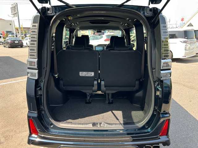 トヨタ ヴォクシー ZS 大阪府 2017(平29)年 4万km ブラッキッシュアゲハガラスフレーク 純正10型ナビ/バックカメラ/モデリスタエアロ/デジタルミラー/ETC純正/アイドリングストップ/衝突軽減システム/レーンキープアシスト/クルーズコントロール/ドラレコ/Bluetooth接続/フルセグTV/3列シート/LEDライト/オートライト/オートハイビーム/純正アルミホイール/両側パワースライドドア/スマートキー