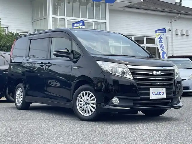 トヨタ ノア ハイブリッド X 愛知県 2014(平26)年 13.6万km ブラック (株)IDOMが運営する【じしゃロン名古屋鳴海店】の自社ローン専用車両になりますこちらは現金またはオートローンご利用時の価格です。自社ローンご希望の方は別途その旨お申付け下さい//ディーラー整備記録簿H27.28.29.30.R1.2.3.4.6//純正9インチナビ/フルセグ/CD/DVD/BT/USB/HDMI//SD/MSV/バックカメラ/ビルトインETC/ステアスイッチ//純正フリップダウンモニター//両側パワースライドドア//プッシュスタート/スマートキー//照明付きバニティミラー//オートリトラウインカーミラー//リアロールサンシェード//コーナーセンサー//純正LEDオートライト//純正フォグ//純正フロアマット//純正ドアバイザー//シートリフター//TVキャンセラー//新車時保証書//取扱説明書//ナビ取説//スペアスマートキー有