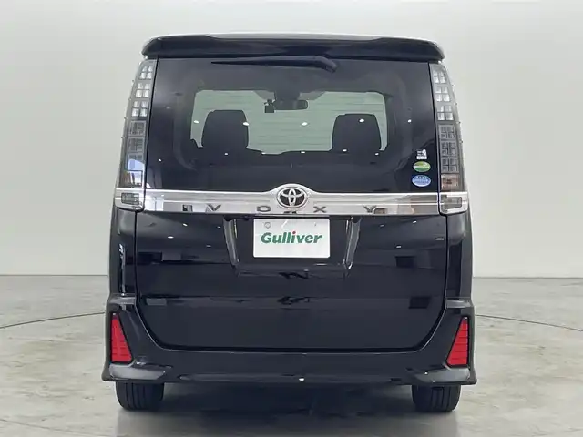 トヨタ ヴォクシー ZS 煌Ⅱ 福岡県 2017(平29)年 3.6万km ブラック 純正１２型後席モニター　/純正１０型ナビ　/バックカメラ　/ビルトインＥＴＣ　/前後ドラレコ　/コーナーセンサー　/衝突軽減ブレーキ　/レーンキープ　/ＭＴモード付き　/両側電動スライドドア　/純正１６インチＡＷ　/ＬＥＤ