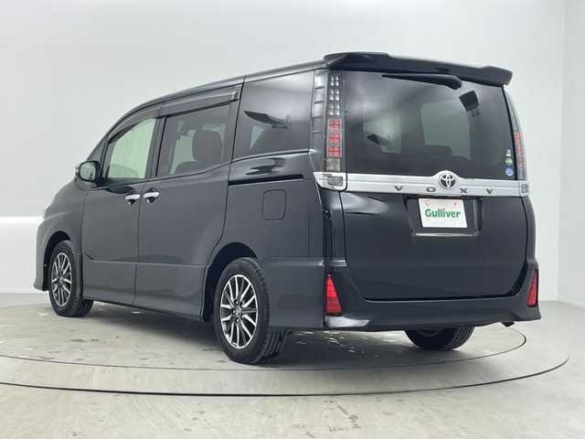 トヨタ ヴォクシー ZS 煌Ⅱ 熊本県 2017(平29)年 3.6万km ブラック 純正１２型後席モニター　/純正１０型ナビ　/バックカメラ　/ビルトインＥＴＣ　/前後ドラレコ　/コーナーセンサー　/衝突軽減ブレーキ　/レーンキープ　/ＭＴモード付き　/両側電動スライドドア　/純正１６インチＡＷ　/ＬＥＤ