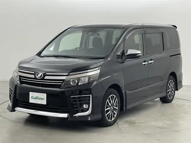 トヨタ ヴォクシー ZS 煌Ⅱ 福岡県 2017(平29)年 3.6万km ブラック 純正１２型後席モニター　/純正１０型ナビ　/バックカメラ　/ビルトインＥＴＣ　/前後ドラレコ　/コーナーセンサー　/衝突軽減ブレーキ　/レーンキープ　/ＭＴモード付き　/両側電動スライドドア　/純正１６インチＡＷ　/ＬＥＤ
