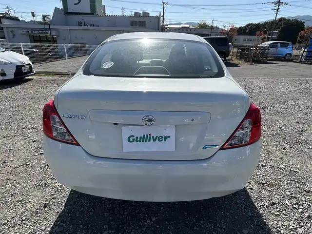 日産 ラティオ G 長崎県 2012(平24)年 12.4万km ホワイトパール 純正ナビ/（CD/DVD/BT/フルセグ）/バックカメラ/ETC/スマートキー/プッシュスタート/電動格納ミラー/アイドリングストップ/ヘッドライトレベライザー