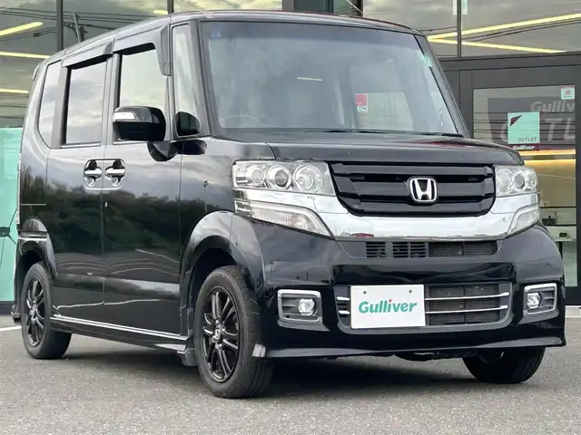 ホンダ Ｎ ＢＯＸ カスタム SSブラックSパッケージ 鹿児島県 2017(平29)年 8.1万km クリスタルブラックパール あんしんパッケージ/純正ナビ/　　CD/DVD/BT/フルセグ/バックカメラ/両側パワースライドドア/HIDオートライト/シートヒーター/純正14インチアルミホイール/ステアリングスイッチ/アイドリングストップ/スマートキー/ETC