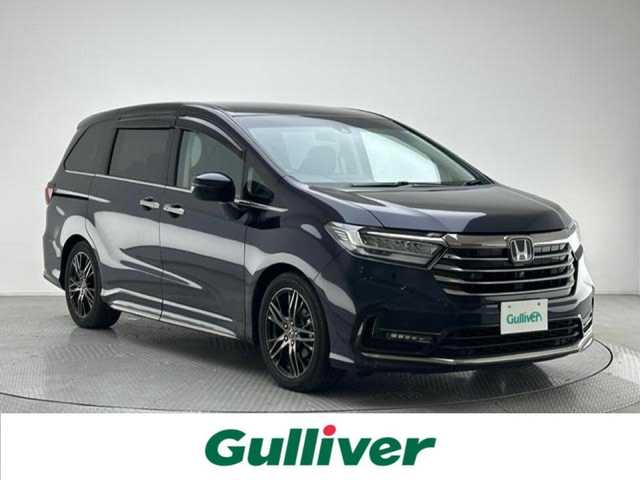 ホンダ オデッセイ アブソルート EX 兵庫県 2021(令3)年 3万km プレミアムヴィーナスブラックP 純正10インチナビ（CD/DVD・FM/AM・BT・フルセグ）/純正フリップダウンモニター/全方位カメラ/両側パワースライドドア/ETC2.0/パワーバックドア/パワーシート（D/N席）/シートヒーター（D/N席）/純正AW18インチ/純正フロアマット/追従式クルーズコントロール/プッシュスタート/スマートキー/BSM/ホンダセンシング/LEDヘッドランプ/フォグランプ/オートライト/電動格納ミラー/ウインカーミラー/ドアバイザー/パドルシフト/コーナーセンサー前後/オットマン