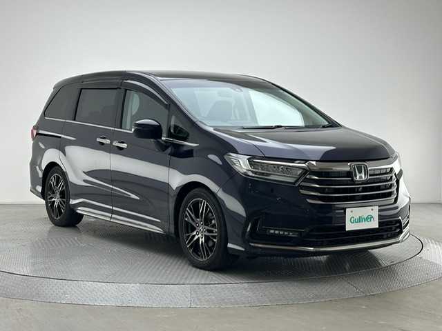 ホンダ オデッセイ アブソルート EX 兵庫県 2021(令3)年 3万km プレミアムヴィーナスブラックP 純正10インチナビ（CD/DVD・FM/AM・BT・フルセグ）/純正フリップダウンモニター/全方位カメラ/両側パワースライドドア/ETC2.0/パワーバックドア/パワーシート（D/N席）/シートヒーター（D/N席）/純正AW18インチ/純正フロアマット/追従式クルーズコントロール/プッシュスタート/スマートキー/BSM/ホンダセンシング/LEDヘッドランプ/フォグランプ/オートライト/電動格納ミラー/ウインカーミラー/ドアバイザー/パドルシフト/コーナーセンサー前後/オットマン
