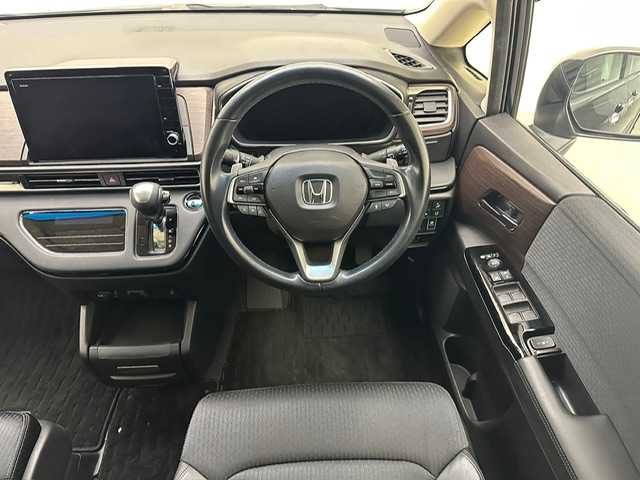 ホンダ オデッセイ アブソルート EX 兵庫県 2021(令3)年 3万km プレミアムヴィーナスブラックP 純正10インチナビ（CD/DVD・FM/AM・BT・フルセグ）/純正フリップダウンモニター/全方位カメラ/両側パワースライドドア/ETC2.0/パワーバックドア/パワーシート（D/N席）/シートヒーター（D/N席）/純正AW18インチ/純正フロアマット/追従式クルーズコントロール/プッシュスタート/スマートキー/BSM/ホンダセンシング/LEDヘッドランプ/フォグランプ/オートライト/電動格納ミラー/ウインカーミラー/ドアバイザー/パドルシフト/コーナーセンサー前後/オットマン