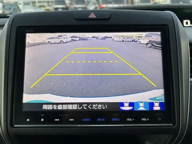 ホンダ フリード ハイブリット EX 岡山県 2016(平28)年 5.4万km ホワイトオーキッドパール 登録時走行距離58334km/ワンオーナー/純正9インチナビ/フルセグTV(AM/FM/CD/DVD/Bluetooth/HDMI)/純正12.8インチフリップダウンモニター/バックカメラ/両側パワースライドドア/ビルトインETC/ホンダセンシング/・アダプティブクルーズコントロール/・レーンキープアシスト/・衝突軽減ブレーキ/・路外逸脱抑制機能/・先行車発進お知らせ機能/・標識認識機能/横滑り抑制機能/車両接近通報装置/フロントガラス熱線スイッチ/D/N席シートヒーター/USB入力端子/ロールサンシェード/ハーフレザーシート/15インチ純正AW　/純正フロアマット