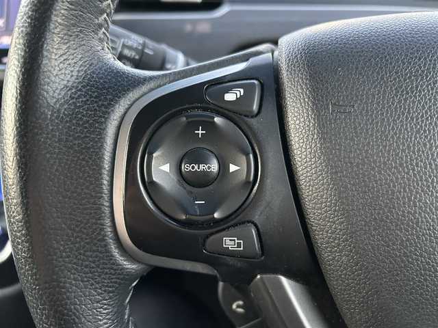 ホンダ フリード ハイブリット EX 岡山県 2016(平28)年 5.4万km ホワイトオーキッドパール 登録時走行距離58334km/ワンオーナー/純正9インチナビ/フルセグTV(AM/FM/CD/DVD/Bluetooth/HDMI)/純正12.8インチフリップダウンモニター/バックカメラ/両側パワースライドドア/ビルトインETC/ホンダセンシング/・アダプティブクルーズコントロール/・レーンキープアシスト/・衝突軽減ブレーキ/・路外逸脱抑制機能/・先行車発進お知らせ機能/・標識認識機能/横滑り抑制機能/車両接近通報装置/フロントガラス熱線スイッチ/D/N席シートヒーター/USB入力端子/ロールサンシェード/ハーフレザーシート/15インチ純正AW　/純正フロアマット