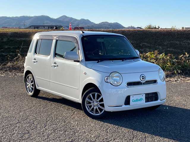 ダイハツ ミラ ココア X 新潟県 2012(平24)年 7.3万km パールホワイトⅢ 4WD/CD/AUX/ベンチシート/革調シートカバー/スマートキー/LEDヘッドライト/社外14インチアルミホイール/純正15インチAW夏タイヤ車載