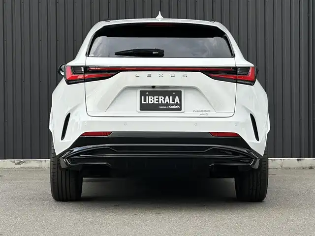 レクサス ＮＸ 350 Fスポーツ 福島県 2022(令4)年 0.9万km ホワイトノーヴァガラスフレーク ＴＲＤエアロ/パノラマサンルーフ/オレンジキャリパー/三眼フルLEDヘッドランプ/デジタルインナーミラー/赤黒レザーシート/メモリ付パワーシート/シートヒーター/シートベンチレーション/純正ナビ/360°カメラ/フルセグTV/ワイヤレス充電/パワーバックドア/純正20インチAW/ドラレコ前後/取扱説明書/保証書