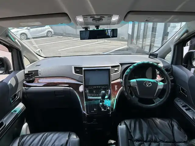 トヨタ ヴェルファイア 2．4Z 佐賀県 2014(平26)年 12.6万km ホワイトパールクリスタルシャイン アルパイン10インチSDナビ/・バックカメラ/・フルセグTV/BT/CD/DVD/アルパインフリップダウンモニター/コーナーセンサー/クルーズコントロール/両側パワースライドドア/純正18インチAW/HIDヘッドライト/オートライト/フォグランプ/オットマン/ETC/スペアキー×１/取扱説明書/保証書