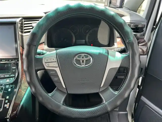 トヨタ ヴェルファイア 2．4Z 佐賀県 2014(平26)年 12.6万km ホワイトパールクリスタルシャイン アルパイン10インチSDナビ/・バックカメラ/・フルセグTV/BT/CD/DVD/アルパインフリップダウンモニター/コーナーセンサー/クルーズコントロール/両側パワースライドドア/純正18インチAW/HIDヘッドライト/オートライト/フォグランプ/オットマン/ETC/スペアキー×１/取扱説明書/保証書