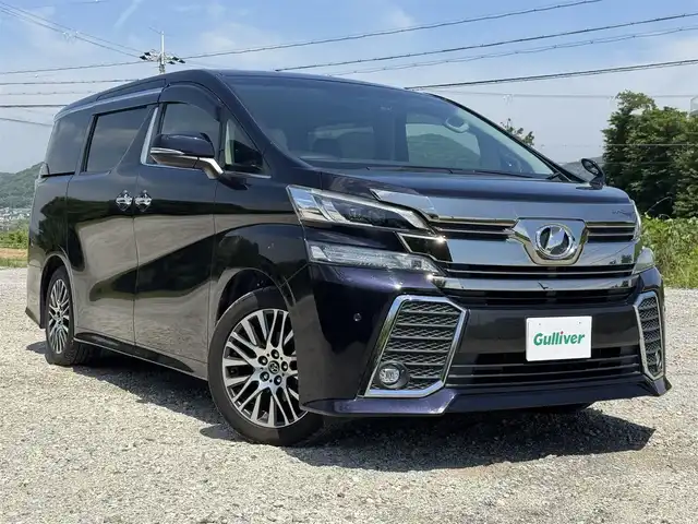 トヨタ ヴェルファイア Z Gエディション 兵庫県 2015(平27)年 1.8万km スパークリングブラックパールクリスタルシャイン 純正9インチナビ/フルセグTV/バックカメラ/Bluetooth接続可/DVD再生可/ビルトインETC/ドラレコ/メモリー付きパワーシート/両側パワースライドドア/クルーズコントロール/ステアリングヒーター/黒ハーフレザーシート
