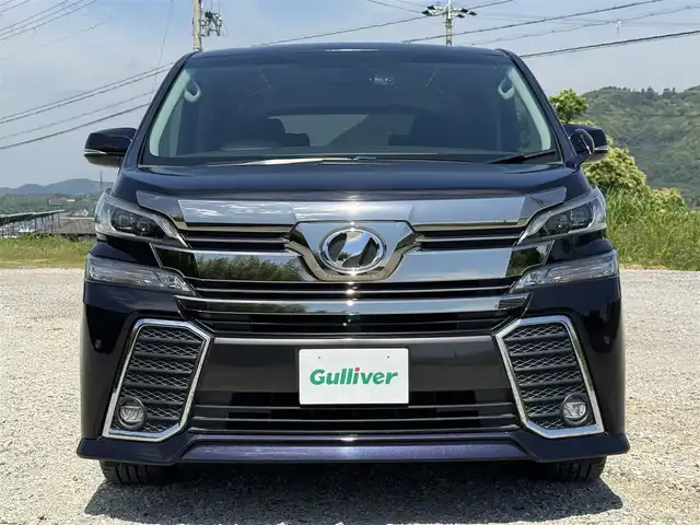 トヨタ ヴェルファイア Z Gエディション 兵庫県 2015(平27)年 1.8万km スパークリングブラックパールクリスタルシャイン 純正9インチナビ/フルセグTV/バックカメラ/Bluetooth接続可/DVD再生可/ビルトインETC/ドラレコ/メモリー付きパワーシート/両側パワースライドドア/クルーズコントロール/ステアリングヒーター/黒ハーフレザーシート