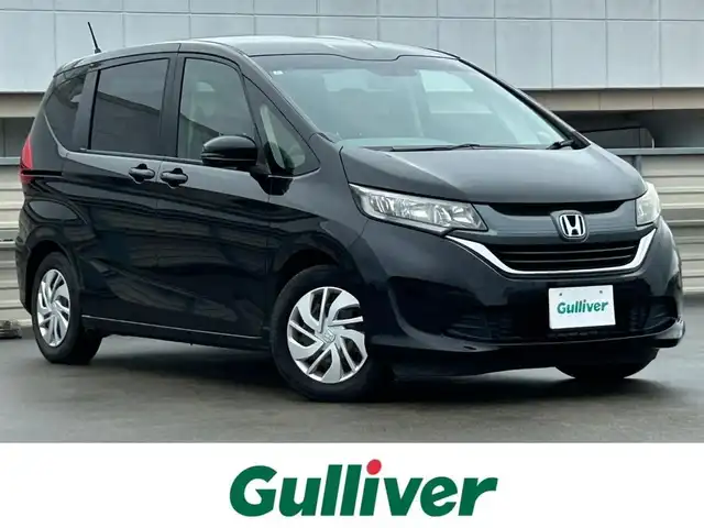 ホンダ フリード G 静岡県 2018(平30)年 6.8万km プレミアムスパークルブラックパール メモリナビ/フルセグテレビ/バックカメラ/プッシュスタート/片側パワースライドドア/ETC/オートライト/横滑り防止装置/ウォークスルー/3列シート/Bluetooth