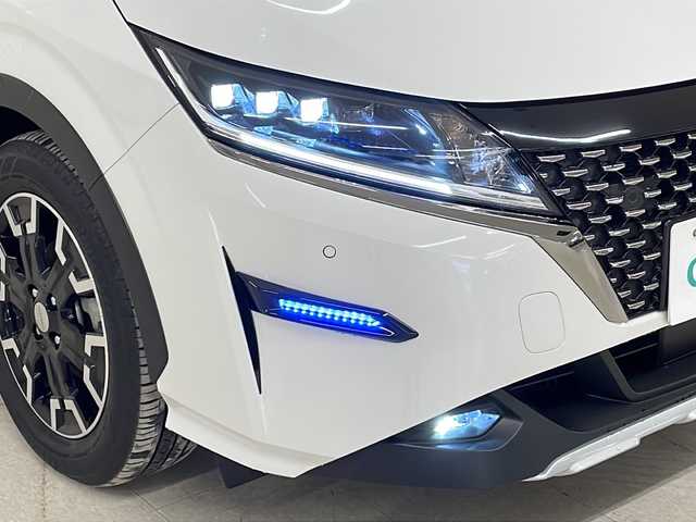 日産 ノート オーテック Xオーバー +アクティブ 熊本県 2024(令6)年 1.3万km ピュアホワイトパール 純正9インチナビ（ラジオ、フルセグ、BT、SD）/アラウンドビューモニター/前方ドライブレコーダー/インテリジェントルームミラー/ステアリングリモコン/オートハイビーム/・オートライト/・LEDヘッドライト/・フォグランプ/エマージェンシーブレーキ/速度標識機能/前後コーナーセンサー/ふらつき警報/ブラインドスポットモニター/レーンキープアシスト/純正フロアマット/プッシュスタート/スマートキー/・スペアキー