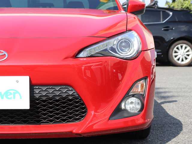 トヨタ ８６ GT リミテッド 神奈川県 2013(平25)年 8.3万km ライトニングレッド ワンオーナー /純正メモリナビ/バックカメラ/ETC  /フルセグテレビ/プッシュスタート/純正17インチAW/Bluetoothオーディオ/リアスポイラー/リアフォグランプ/フロアアンダーカバー/アルカンターラコンビシート/シートヒーター/保証書/取説