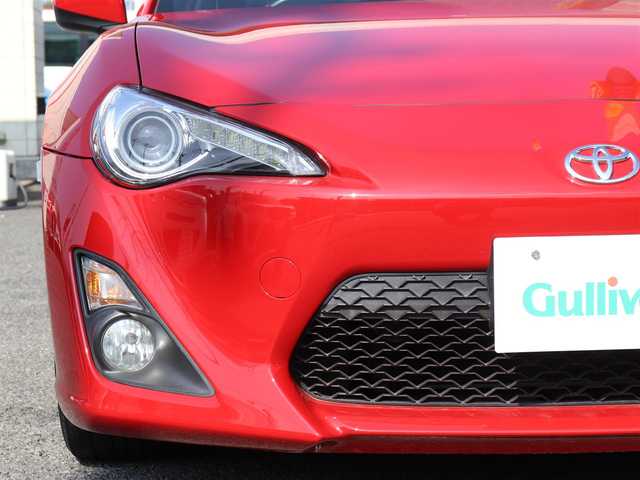 トヨタ ８６ GT リミテッド 神奈川県 2013(平25)年 8.3万km ライトニングレッド ワンオーナー /純正メモリナビ/バックカメラ/ETC  /フルセグテレビ/プッシュスタート/純正17インチAW/Bluetoothオーディオ/リアスポイラー/リアフォグランプ/フロアアンダーカバー/アルカンターラコンビシート/シートヒーター/保証書/取説