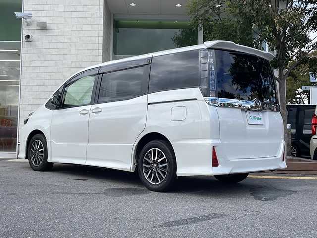 トヨタ ヴォクシー ZS 鳥取県 2017(平29)年 7.4万km ホワイトパールクリスタルシャイン ワンオーナー/パワースライドドア/アルパイン11インチナビ/フルセグTV　DVD CD Bluetooth　SD/バックカメラ/ETC/ドライブレコーダー前後室内/社外レーダー/トヨタセーフティセンス/・衝突回避支援機能/・レーンディパーチャーアラート/・オートマチックハイビーム/・先行車発進/・信号情報/・緊急時操舵支援/S-VSC/MTモード付AT/アイドリングストップ/オートマチックハイビーム/プッシュスタート/フロアマット/ドアバイザー/LEDライト/フォグランプ/１６インチアルミ/ターンミラー/プライバシーガラス/スマートキー/スペアキー/新車保証書/取扱説明書