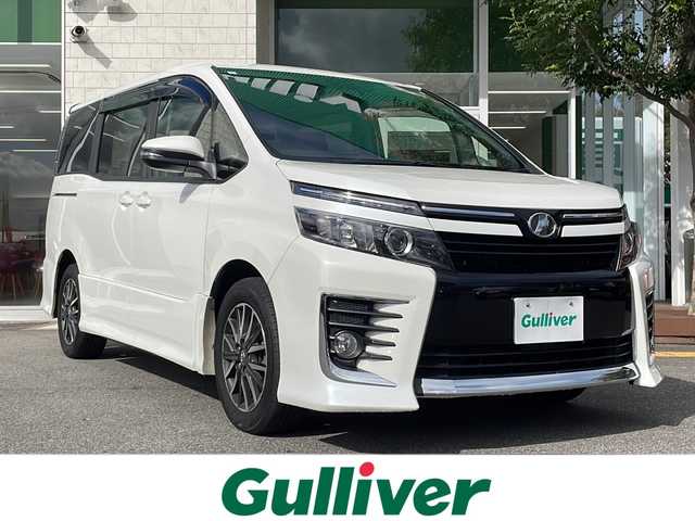 トヨタ ヴォクシー ZS 鳥取県 2017(平29)年 7.4万km ホワイトパールクリスタルシャイン ワンオーナー/パワースライドドア/アルパイン11インチナビ/フルセグTV　DVD CD Bluetooth　SD/バックカメラ/ETC/ドライブレコーダー前後室内/社外レーダー/トヨタセーフティセンス/・衝突回避支援機能/・レーンディパーチャーアラート/・オートマチックハイビーム/・先行車発進/・信号情報/・緊急時操舵支援/S-VSC/MTモード付AT/アイドリングストップ/オートマチックハイビーム/プッシュスタート/フロアマット/ドアバイザー/LEDライト/フォグランプ/１６インチアルミ/ターンミラー/プライバシーガラス/スマートキー/スペアキー/新車保証書/取扱説明書