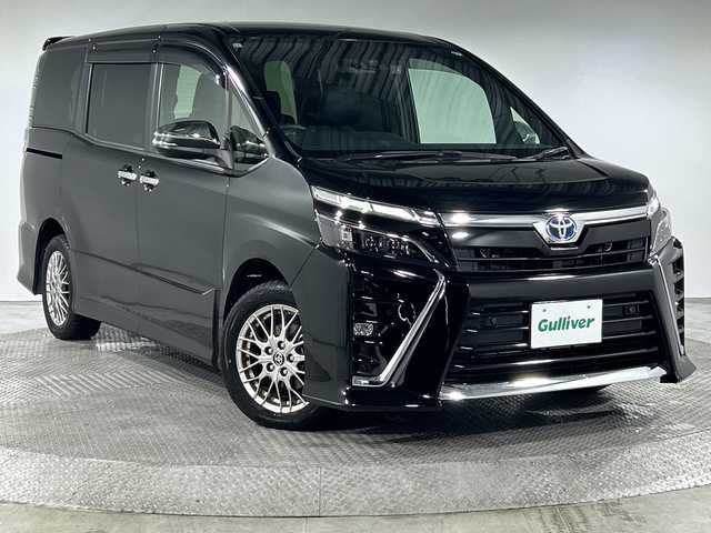 トヨタ ヴォクシー ハイブリッド ZS 煌Ⅲ 神奈川県 2021(令3)年 4.4万km ブラック トヨタセーフティセンス/・プリクラッシュセーフティ/・レーンディパーチャーアラート/・オートマチックハイビーム/純正10型ナビ/・BT/フルセグTV/SD/CD/DVD/バックカメラ/純正フリップダウンモニター/両側電動スライドドア/ハーフレザーシート/シートヒーター(D/N)/ビルトインETC/ドライブレコーダー/スマートキー/プッシュスタートボタン/革巻きステアリング/ステアリングスイッチ/クルーズコントロール/Autoライト/LEDヘッドライト/フォグランプ/コーナーセンサー/シートリフター/電動格納ミラー/ウィンカーミラー/純正フロアマット/純正16インチアルミホイール/純正ドアバイザー