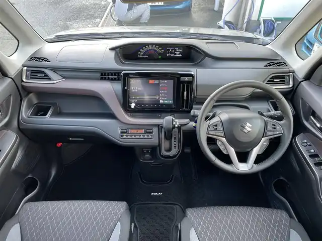 スズキ ソリオ バンディット HV SV 東京都 2024(令6)年 0.2万km タフカーキパールメタリック 純正９型ナビ/ＴＶ/Ｂｌｕｅｔｏｏｔｈ/全方位モニター/両側電動スライド/追従クルーズ/デュアルカメラブレーキ/シートヒーター/コーナーセンサー/ヘッドアップディスプレイ/サーキュレーター