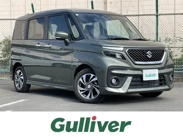 スズキ ソリオ バンディット HV SV 東京都 2024(令6)年 0.2万km タフカーキパールメタリック 純正９型ナビ/ＴＶ/Ｂｌｕｅｔｏｏｔｈ/全方位モニター/両側電動スライド/追従クルーズ/デュアルカメラブレーキ/シートヒーター/コーナーセンサー/ヘッドアップディスプレイ/サーキュレーター