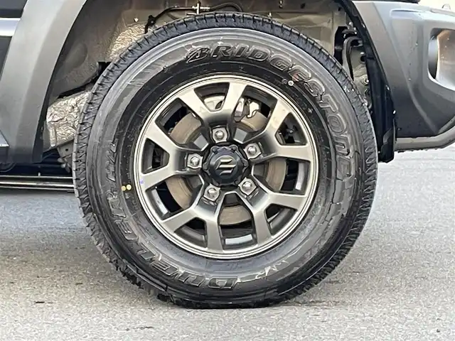 スズキ ジムニー ノマド FC 群馬県 2025(令7)年 0.1万km 黒 登録時走行距離１６０ｋｍ　/前席シートヒーター　/衝突軽減ブレーキ　/レーンアシスト　/アダプティブクルーズコントロール　/純正１５インチアルミホイール　/ミラーヒーター　/純正フロアマット　/スマートキー　/ＬＥＤ