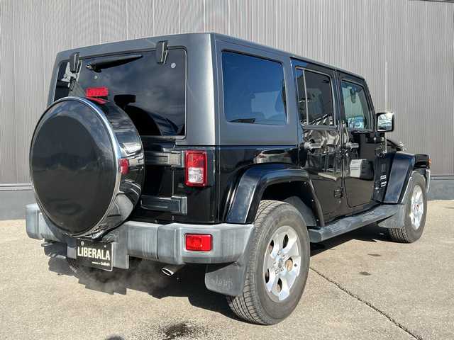 クライスラー・ジープ ジープ ラングラー アンリミテッド スポーツ 道東・釧路十勝 2016(平28)年 4.2万km 黒 ワンオーナー/４WD/社外メモリナビ/ CD/DVD/SD/BT/フルセグ/バックカメラ/サイドカメラ/社外ETC/クルーズコントロール/純正18インチAW/純正フロアマット/ハロゲンヘッドライト/社外フェンダー/社外バンパー/取扱説明書/保証書/スペアキー