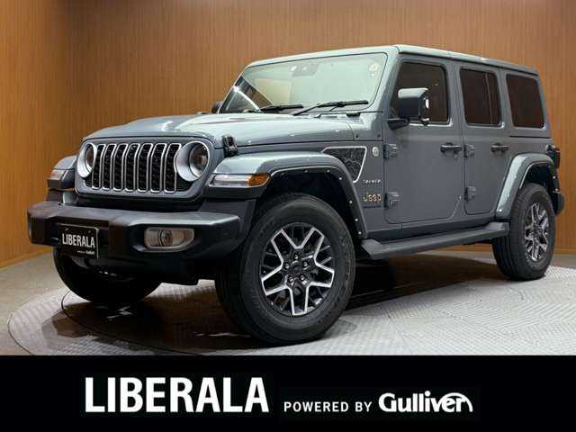 クライスラー・ジープ ジープ ラングラー アンリミテッド サハラ ローンチエディション 千葉県 2024(令6)年 2万km アンヴィルクリアコート 特別限定車　/ＡＣＣ　/本革　/ナビ　/Ｂカメラ　/ＣａｒＰｌａｙ　/Ｂｌｕｅｔｏｏｔｈ接続　/シートＨ　/ステアリングヒーター　/純正アルパインスピーカー　/衝突軽減Ｂ　/ＬＥＤヘッドライト　/純正ドラレコ　/１オーナー