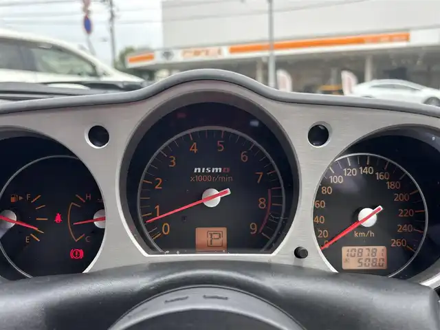 日産 フェアレディ Ｚ バージョンNISMO 熊本県 2007(平19)年 10.9万km プレミアムパッショネイトオレンジ 純正エアロパーツ/リアウィング/ブレンボキャリパー/社外ナビ(AVIC-VH099G)/【ワンセグTV/CD/DVD】/バックカメラ /ハーフレザーシート/純正18インチアルミホイール/オーバーフェンダー/純正フロアマット/横滑り防止装置/盗難防止装置/取扱説明書/保証書/リモコンキー