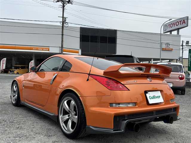 日産 フェアレディ Ｚ バージョンNISMO 熊本県 2007(平19)年 10.9万km プレミアムパッショネイトオレンジ 純正エアロパーツ/リアウィング/ブレンボキャリパー/社外ナビ(AVIC-VH099G)/【ワンセグTV/CD/DVD】/バックカメラ /ハーフレザーシート/純正18インチアルミホイール/オーバーフェンダー/純正フロアマット/横滑り防止装置/盗難防止装置/取扱説明書/保証書/リモコンキー