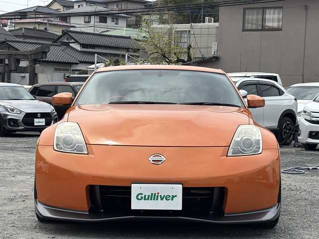 日産 フェアレディ Ｚ バージョンNISMO 熊本県 2007(平19)年 10.9万km プレミアムパッショネイトオレンジ 純正エアロパーツ/リアウィング/ブレンボキャリパー/社外ナビ(AVIC-VH099G)/【ワンセグTV/CD/DVD】/バックカメラ /ハーフレザーシート/純正18インチアルミホイール/オーバーフェンダー/純正フロアマット/横滑り防止装置/盗難防止装置/取扱説明書/保証書/リモコンキー