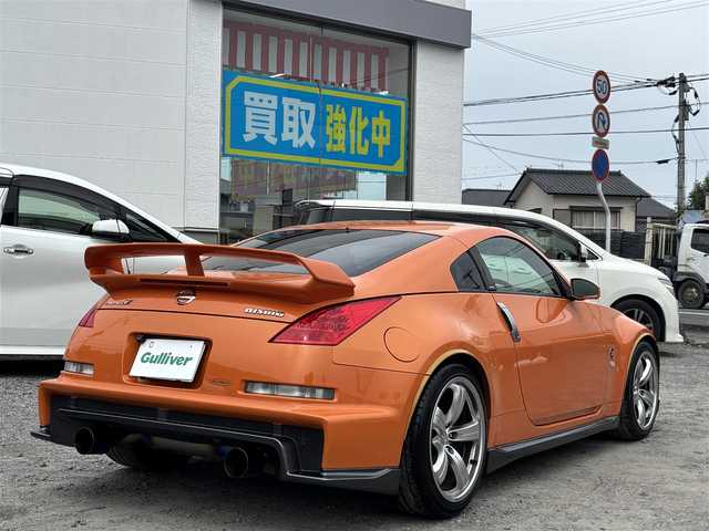 日産 フェアレディ Ｚ バージョンNISMO 熊本県 2007(平19)年 10.9万km プレミアムパッショネイトオレンジ 純正エアロパーツ/リアウィング/ブレンボキャリパー/社外ナビ(AVIC-VH099G)/【ワンセグTV/CD/DVD】/バックカメラ /ハーフレザーシート/純正18インチアルミホイール/オーバーフェンダー/純正フロアマット/横滑り防止装置/盗難防止装置/取扱説明書/保証書/リモコンキー