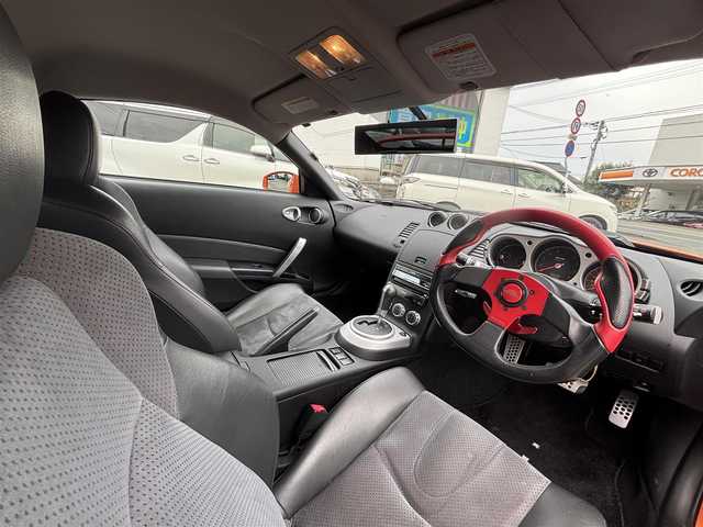 日産 フェアレディ Ｚ バージョンNISMO 熊本県 2007(平19)年 10.9万km プレミアムパッショネイトオレンジ 純正エアロパーツ/リアウィング/ブレンボキャリパー/社外ナビ(AVIC-VH099G)/【ワンセグTV/CD/DVD】/バックカメラ /ハーフレザーシート/純正18インチアルミホイール/オーバーフェンダー/純正フロアマット/横滑り防止装置/盗難防止装置/取扱説明書/保証書/リモコンキー