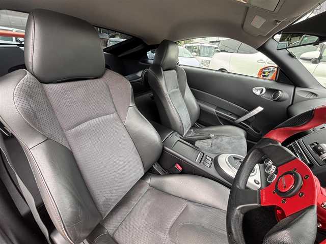日産 フェアレディ Ｚ バージョンNISMO 熊本県 2007(平19)年 10.9万km プレミアムパッショネイトオレンジ 純正エアロパーツ/リアウィング/ブレンボキャリパー/社外ナビ(AVIC-VH099G)/【ワンセグTV/CD/DVD】/バックカメラ /ハーフレザーシート/純正18インチアルミホイール/オーバーフェンダー/純正フロアマット/横滑り防止装置/盗難防止装置/取扱説明書/保証書/リモコンキー