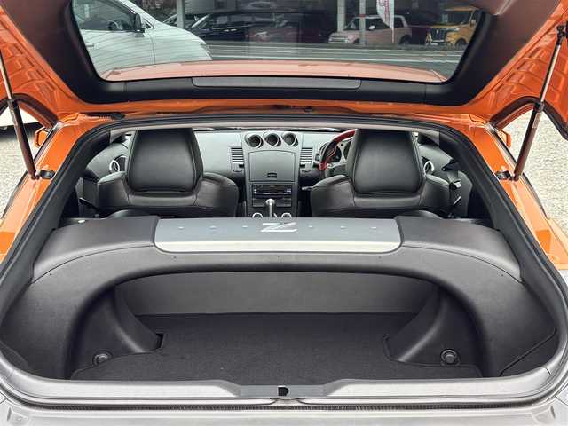 日産 フェアレディ Ｚ バージョンNISMO 熊本県 2007(平19)年 10.9万km プレミアムパッショネイトオレンジ 純正エアロパーツ/リアウィング/ブレンボキャリパー/社外ナビ(AVIC-VH099G)/【ワンセグTV/CD/DVD】/バックカメラ /ハーフレザーシート/純正18インチアルミホイール/オーバーフェンダー/純正フロアマット/横滑り防止装置/盗難防止装置/取扱説明書/保証書/リモコンキー