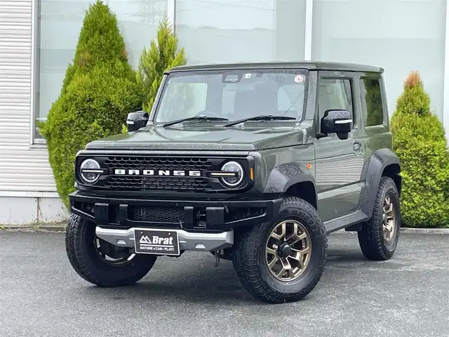 スズキ ジムニー シエラ JC 岩手県 2022(令4)年 2万km ジャングルグリーン BRONSSフェイスチェンジキット/カロッツェリアディスプレイオーディオ/（CD/DVD/Bluetooth）/コムテック前後ドライブレコーダー/純正ホイール塗装/D/Nシートヒーター /クルーズコントロール/LEDヘッドライト/衝突軽減ブレーキ
