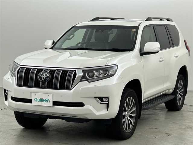 トヨタ ランドクルーザー プラド TX Lパッケージ 福岡県 2021(令3)年 6.2万km ホワイトパールクリスタルシャイン サンルーフ　/純正ＤＡナビ　/全方位カメラ　/ＥＴＣ２．０　/前後ドラレコ　/ＡＣＣ　/コーナーセンサー　/衝突軽減ブレーキ　/レーンキープ　/ＢＳＭ　/ヒルディセントコントロール　/シートヒーター　/パワーシート　/ＬＥＤ