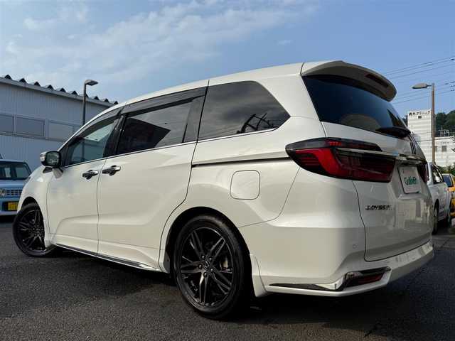 ホンダ オデッセイ ハイブリッド e:HEVアブソルート EX 静岡県 2021(令3)年 4.9万km プラチナホワイトパール ワンオーナー・保証書/走行48989キロ（登録時）/検査令和8年2月4日まで/衝突軽減ブレーキ/車線逸脱支援システム/両側パワースライドドア/パワーバックドア/Gathers10インチプレミアム/　　　　　　　　　　インターナビ/　・DVD再生可能 /Bluetooth/　・フルセグTV   /SD音楽録音/AC100V  1500W/全方位カメラ/ビルトインETC2.0/ナビ連動ドライブレコーダー/アダプティブクルーズコントロール/ハーフレザーシート/前席パワーシート・シートヒーター/スマートキー×2/プッシュスタート/LEDヘッドライト/純正18インチアルミ/オットマン/デッキボード＆ラゲッジBOX/フットライト/マッドガード/純正フロアマット/純正ドアバイザー/車両取説＋ナビ取説