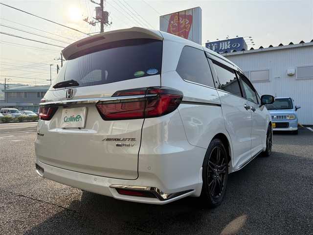 ホンダ オデッセイ ハイブリッド e:HEVアブソルート EX 静岡県 2021(令3)年 4.9万km プラチナホワイトパール ワンオーナー・保証書/走行48989キロ（登録時）/検査令和8年2月4日まで/衝突軽減ブレーキ/車線逸脱支援システム/両側パワースライドドア/パワーバックドア/Gathers10インチプレミアム/　　　　　　　　　　インターナビ/　・DVD再生可能 /Bluetooth/　・フルセグTV   /SD音楽録音/AC100V  1500W/全方位カメラ/ビルトインETC2.0/ナビ連動ドライブレコーダー/アダプティブクルーズコントロール/ハーフレザーシート/前席パワーシート・シートヒーター/スマートキー×2/プッシュスタート/LEDヘッドライト/純正18インチアルミ/オットマン/デッキボード＆ラゲッジBOX/フットライト/マッドガード/純正フロアマット/純正ドアバイザー/車両取説＋ナビ取説