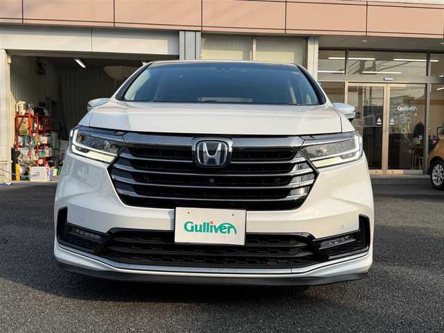 ホンダ オデッセイ ハイブリッド e:HEVアブソルート EX 静岡県 2021(令3)年 4.9万km プラチナホワイトパール ワンオーナー・保証書/走行48989キロ（登録時）/検査令和8年2月4日まで/衝突軽減ブレーキ/車線逸脱支援システム/両側パワースライドドア/パワーバックドア/Gathers10インチプレミアム/　　　　　　　　　　インターナビ/　・DVD再生可能 /Bluetooth/　・フルセグTV   /SD音楽録音/AC100V  1500W/全方位カメラ/ビルトインETC2.0/ナビ連動ドライブレコーダー/アダプティブクルーズコントロール/ハーフレザーシート/前席パワーシート・シートヒーター/スマートキー×2/プッシュスタート/LEDヘッドライト/純正18インチアルミ/オットマン/デッキボード＆ラゲッジBOX/フットライト/マッドガード/純正フロアマット/純正ドアバイザー/車両取説＋ナビ取説