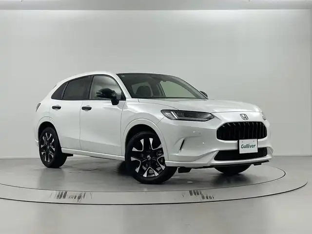 ホンダ ＺＲ－Ｖ ハイブリッド e:HEV Z 埼玉県 2024(令6)年 0.6万km プラチナホワイトパール Honda　CONNECT 9インチナビディスプレー/地デジフルセグ/ホンダセンシング　/ブラック本革シート　/運転席8ウェイ助手席4ウェイパワーシート　/運転席＆助手席シートヒーター/ハンズフリーアクセスパワーテールゲート/BOSEプレミアムサウンドシステム　/後退出庫サポート/マルチビューカメラシステム　/ブラインドスポットインフォメーション　/ETC2.0車載器ナビ連動/ワイヤレス充電器/純正ドライブレコーダー前後/LEDヘッドライト/前後コーナーセンサー/純正18インチアルミホイール