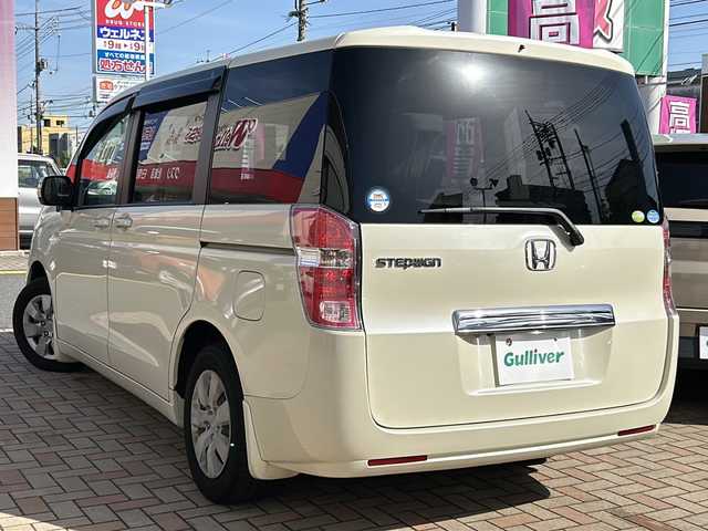 ホンダ ステップワゴン G Lパッケージ 鳥取県 2010(平22)年 11.2万km プレミアムヒダマリアイボリーパール 純正キーレス/両側パワースライド/純正HDDインターナビ/ワンセグ・MSV/バックカメラ/リアクーラー/ビルトインETC/保証書。取説